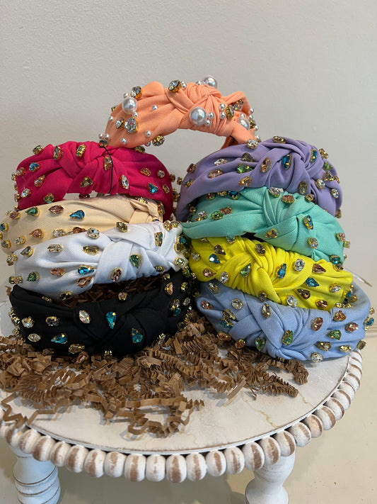 Assorted multicolor jeweled headbands.
