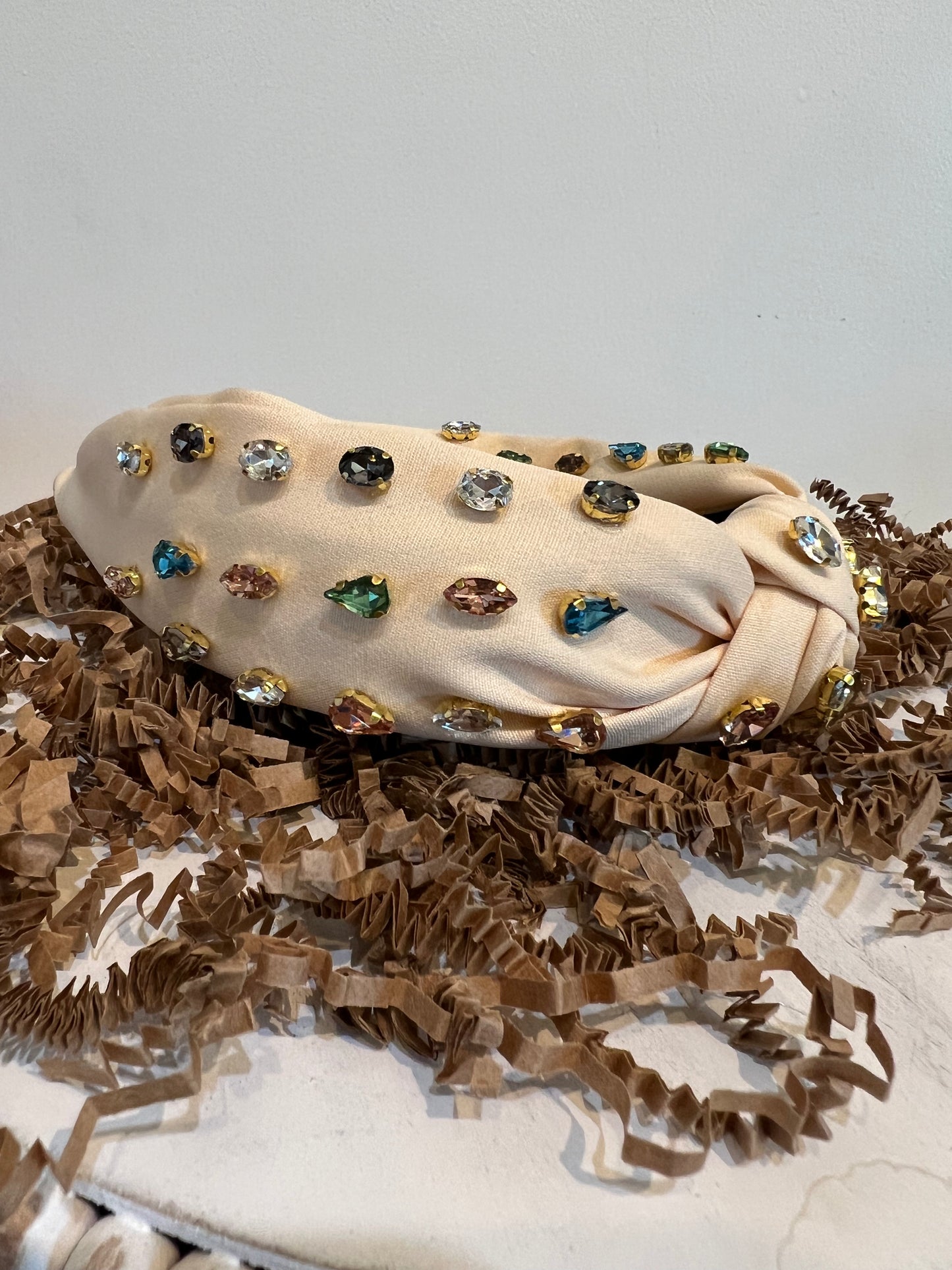 Cream multicolor jeweled headband.