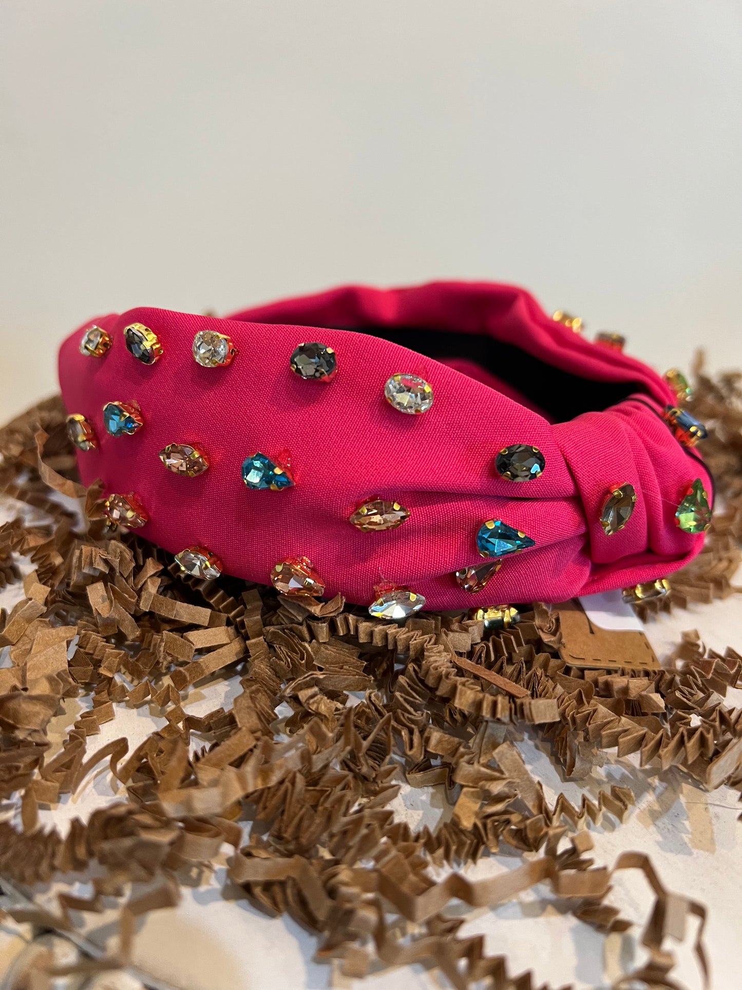Pink multicolor jeweled headband.