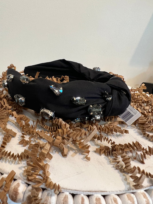 Black topknot headband with clear jewels.