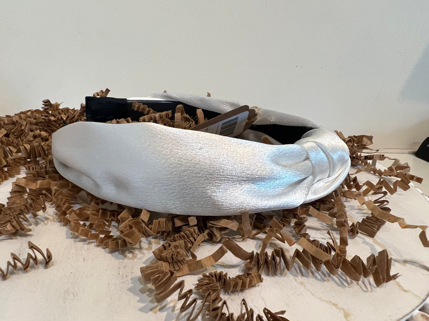 White satin headband.