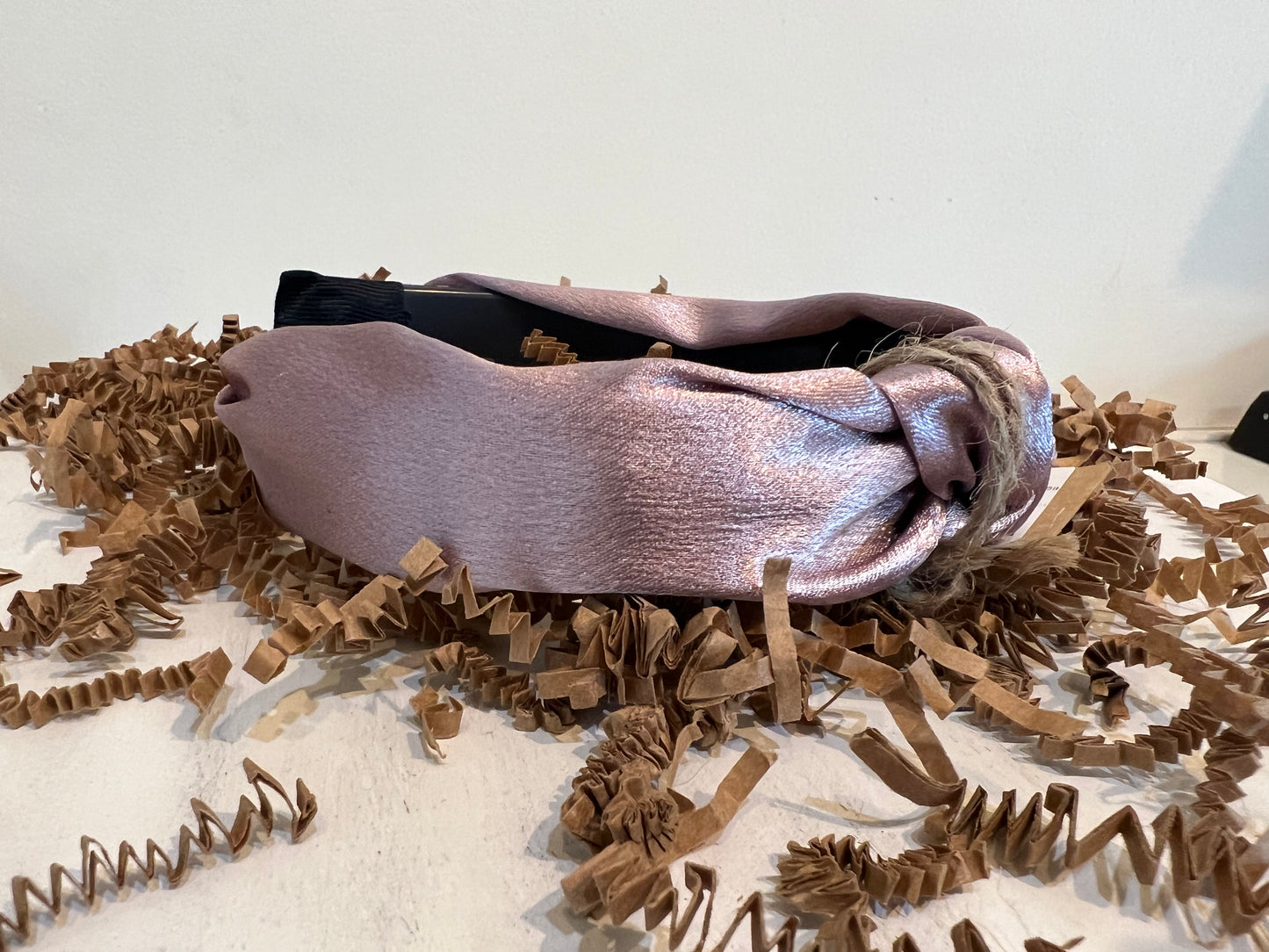 Blush satin headband.