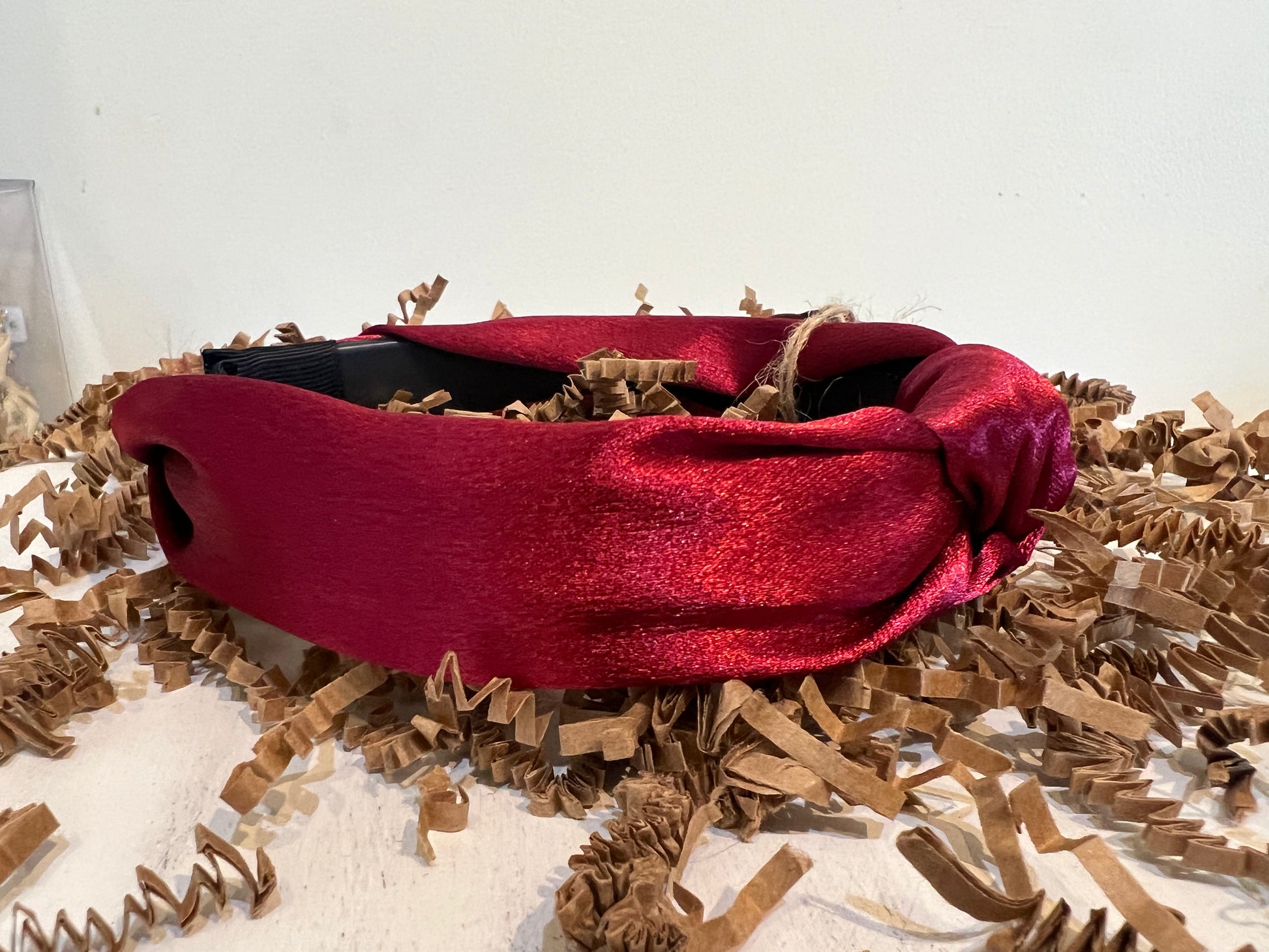 Burgundy satin headband.
