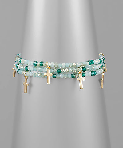 Beaded mint colored cross bracelet with cross charms