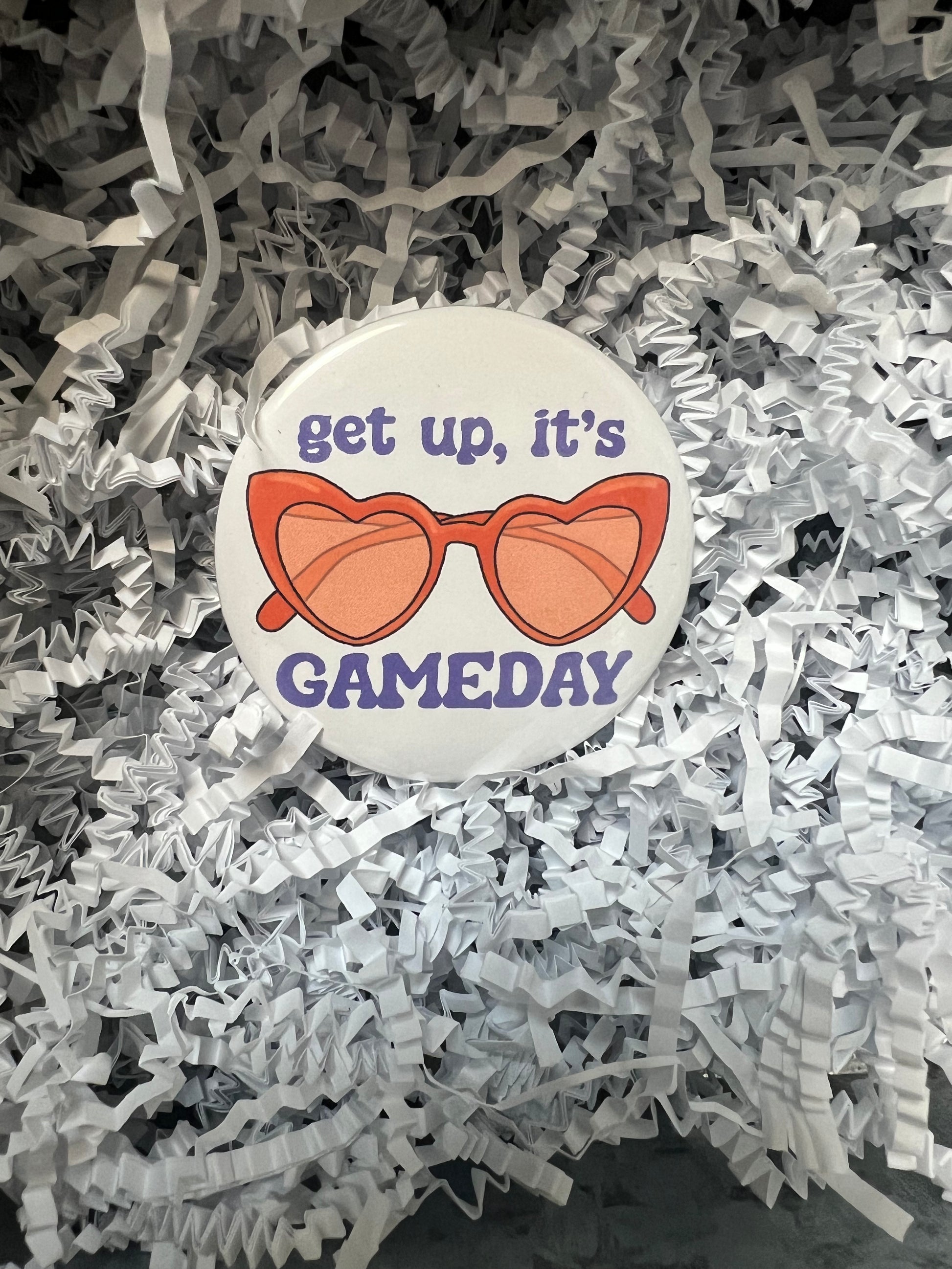 "Get up, it's game day" Clemson Tigers button with orange sunglasses and purple lettering.