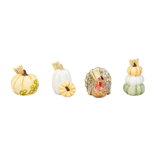 Assorted Autumn toothpick holders featuring pumpkins and a turkey.