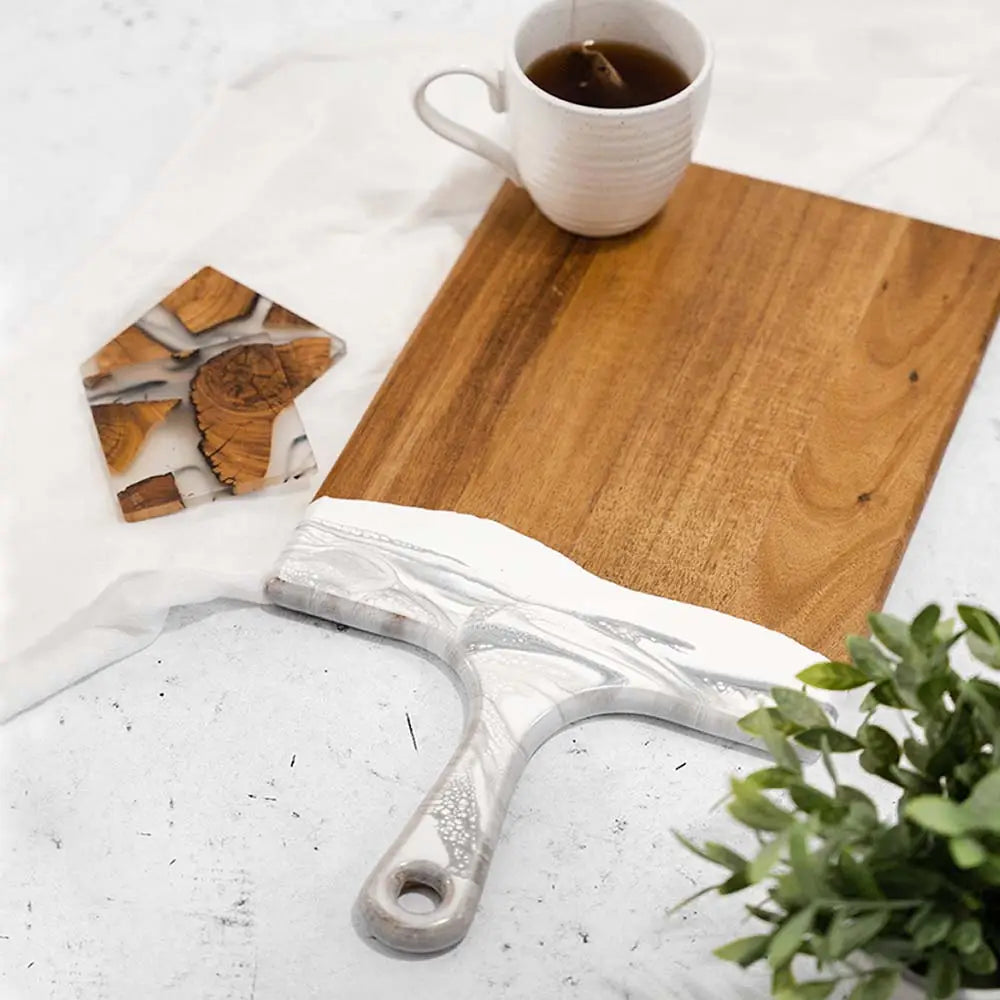 Square white and gray marble dipped board with handle.