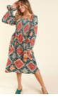 Model featuring smocked Mexico dress.