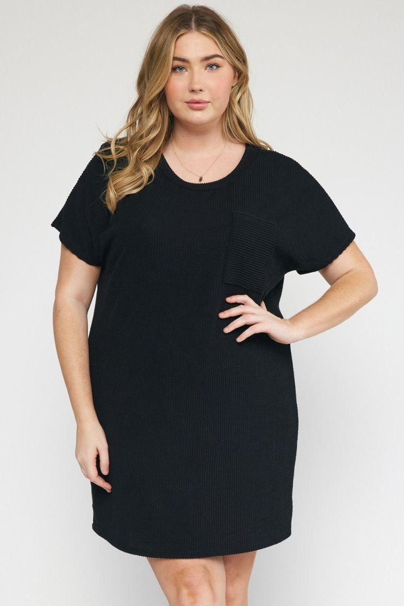 Model featuring black ribbed t-shirt dress.