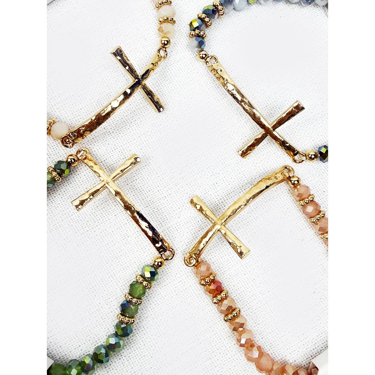 Love and Repeat - Hammered Cross Bead Stretch Bracelet