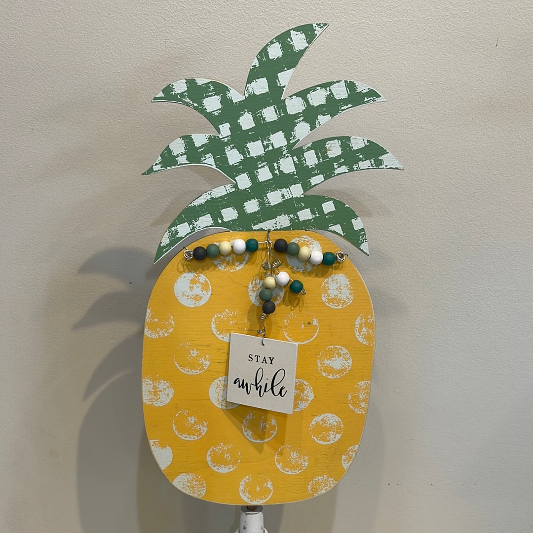 Pineapple topper for welcome sign.