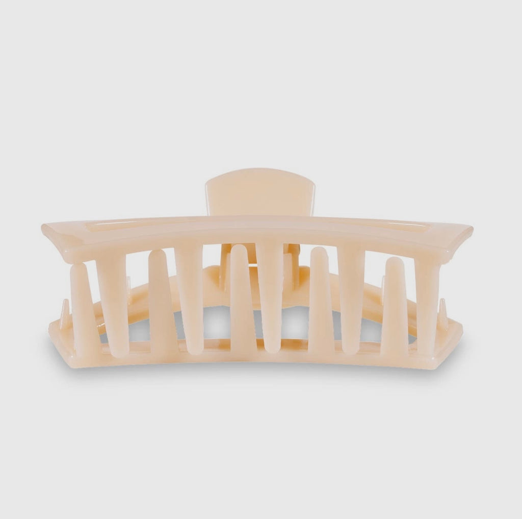 Almond beige teletie open claw clip.