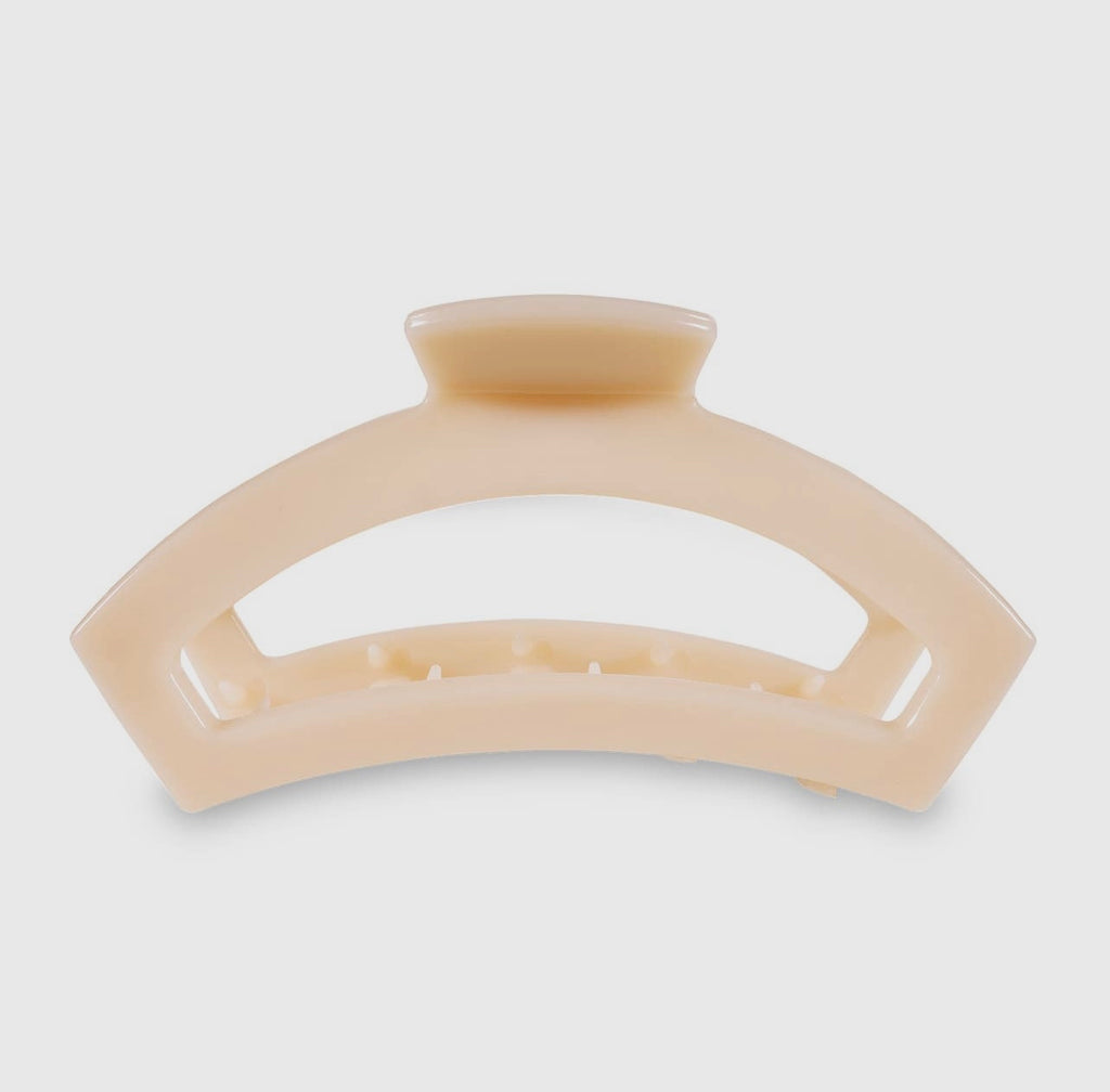 Almond beige teletie open claw clip.