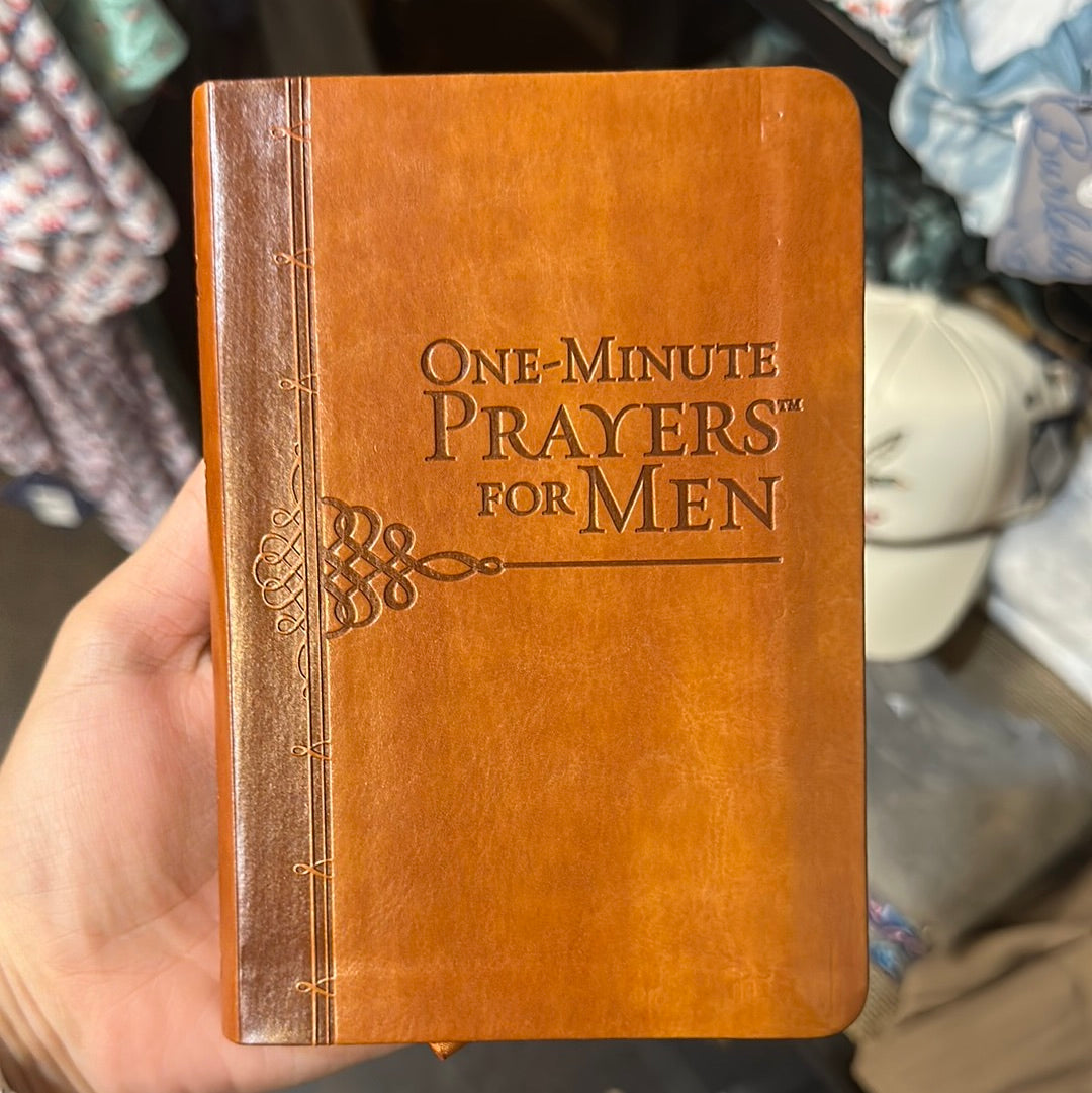 Brown book with flower titling "One-minute Prayers for Men".
