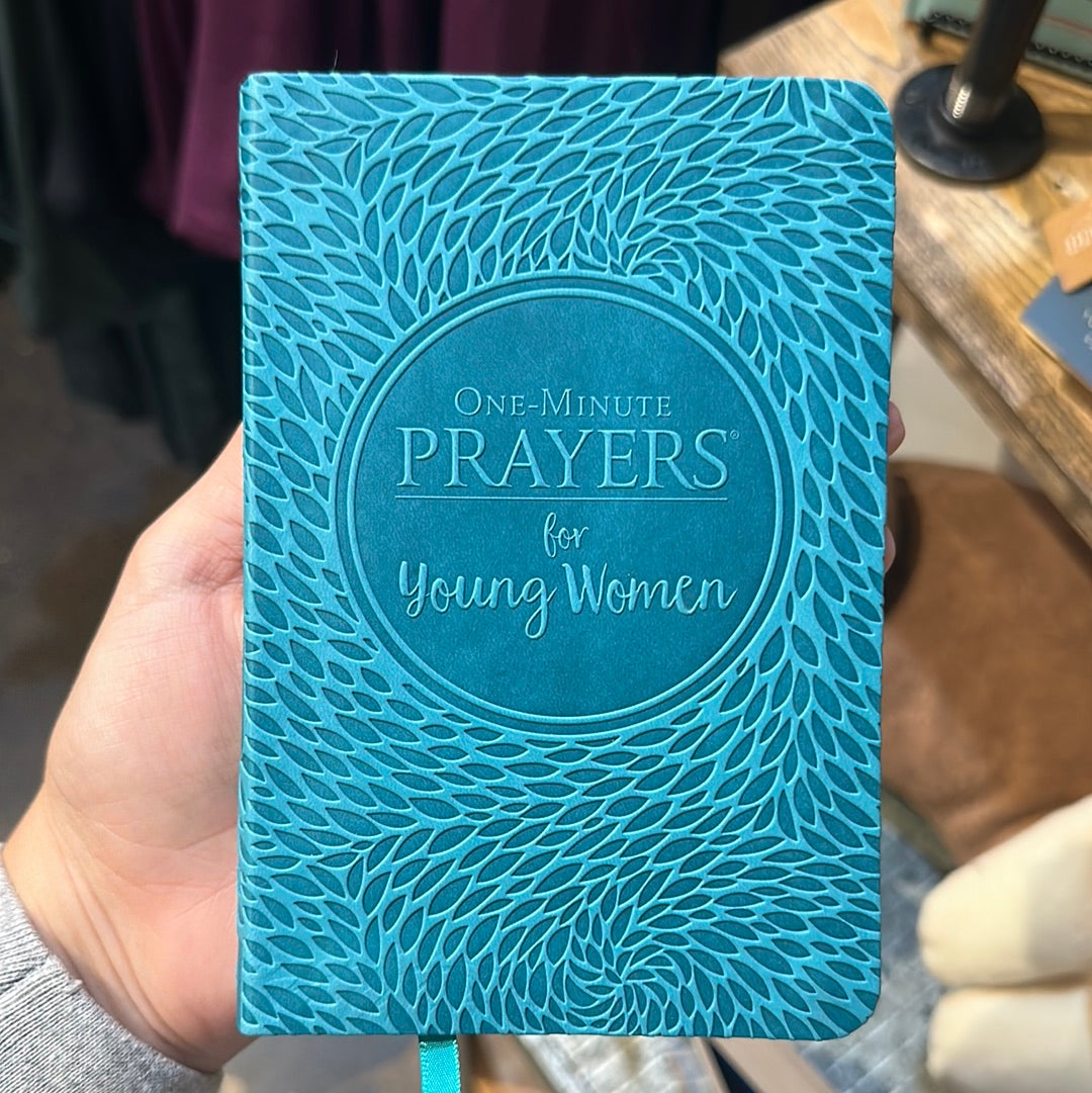 Blue book with texture, titling "One-minute Prayers for Young Women".