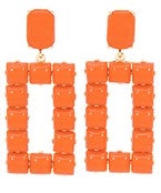 Orange rectangle studded earrings.