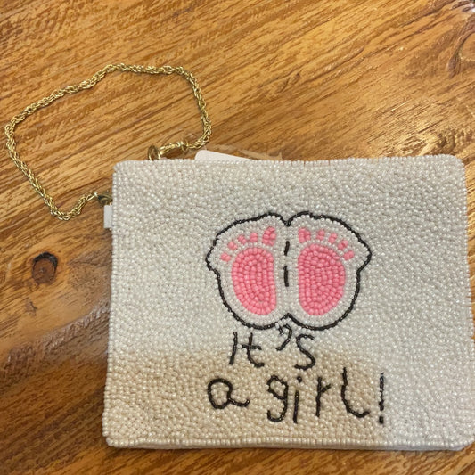 White beaded coin purse featuring "It's a girl" with pink beaded footprints.