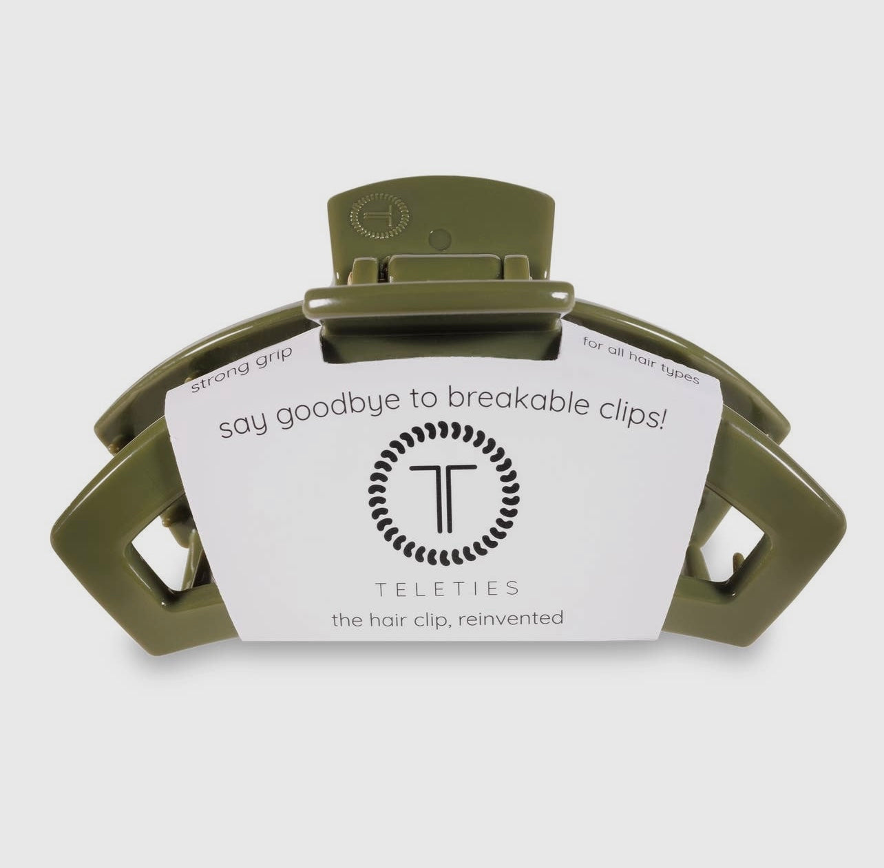 Olive teletie open claw clip.