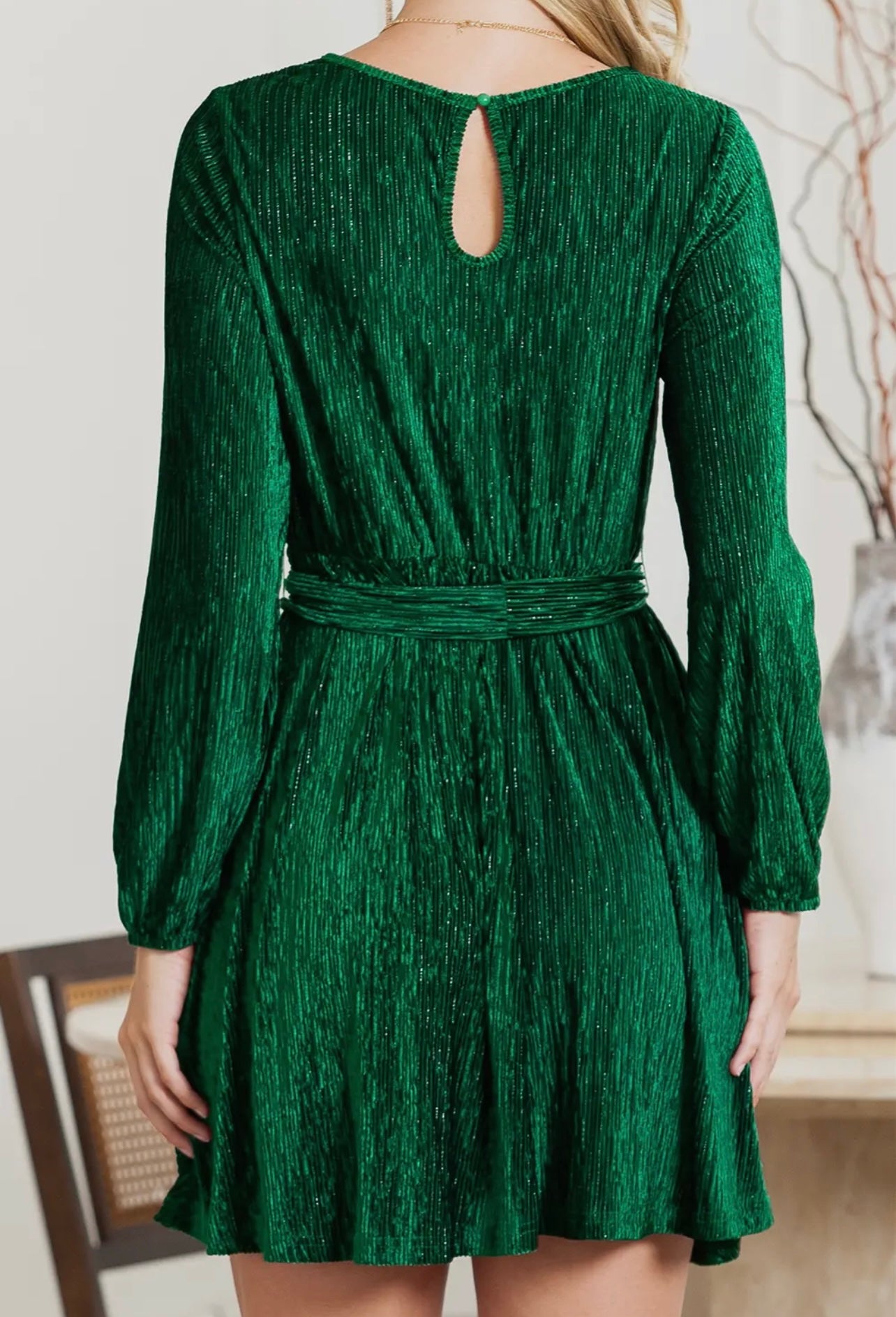 Model featuring green Velvet Crinkle Tie Waist Dress.