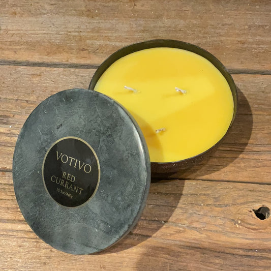 Three wick yellow candle with hammered stone jar.