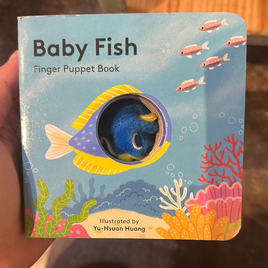 "Baby Fish" finger puppet book with a blue fish in the sea.