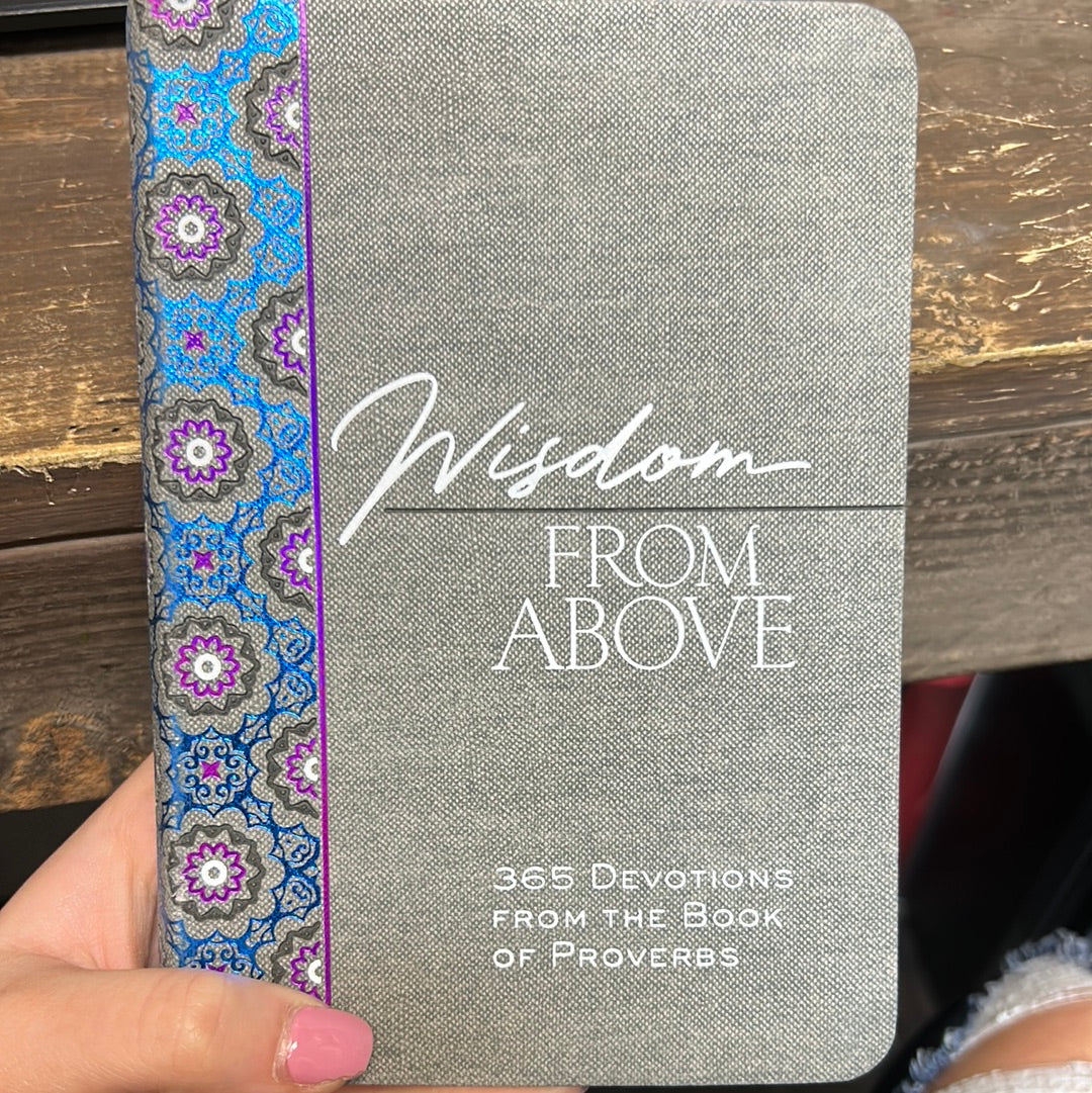 Gray book with geometric patterned binder titling "Wisdom From Above".
