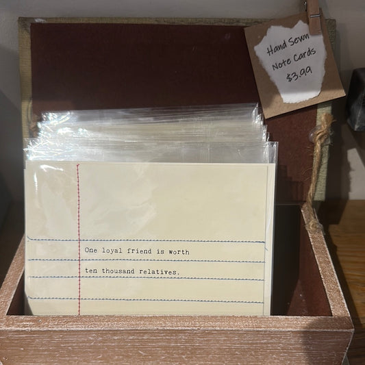 Hand sewn note cards made to look like notebook paper.