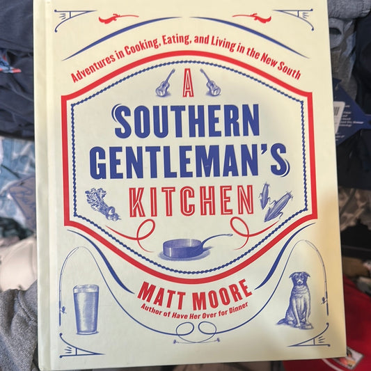 Book with differing motifs in red, white, and blue titling "Southern Gentleman's Kitchen".