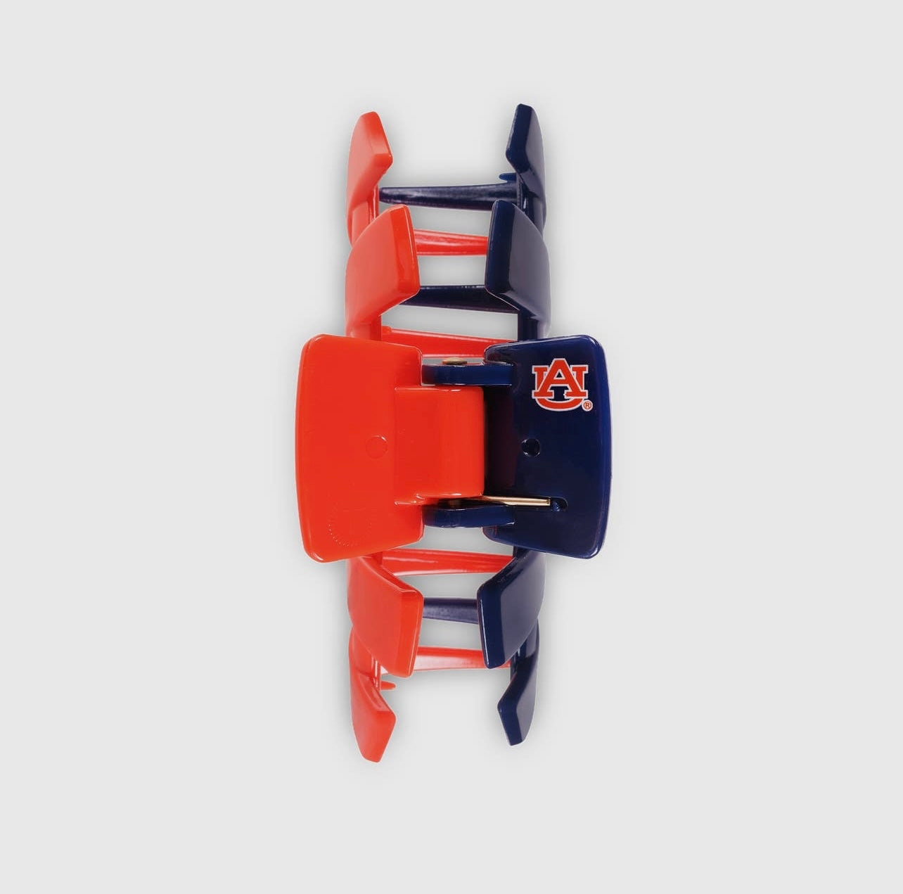 University of Auburn Collegiate Teletie Claw Clip in orange and blue. Top view.