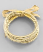 Gold jelly tube bangle bracelet set.