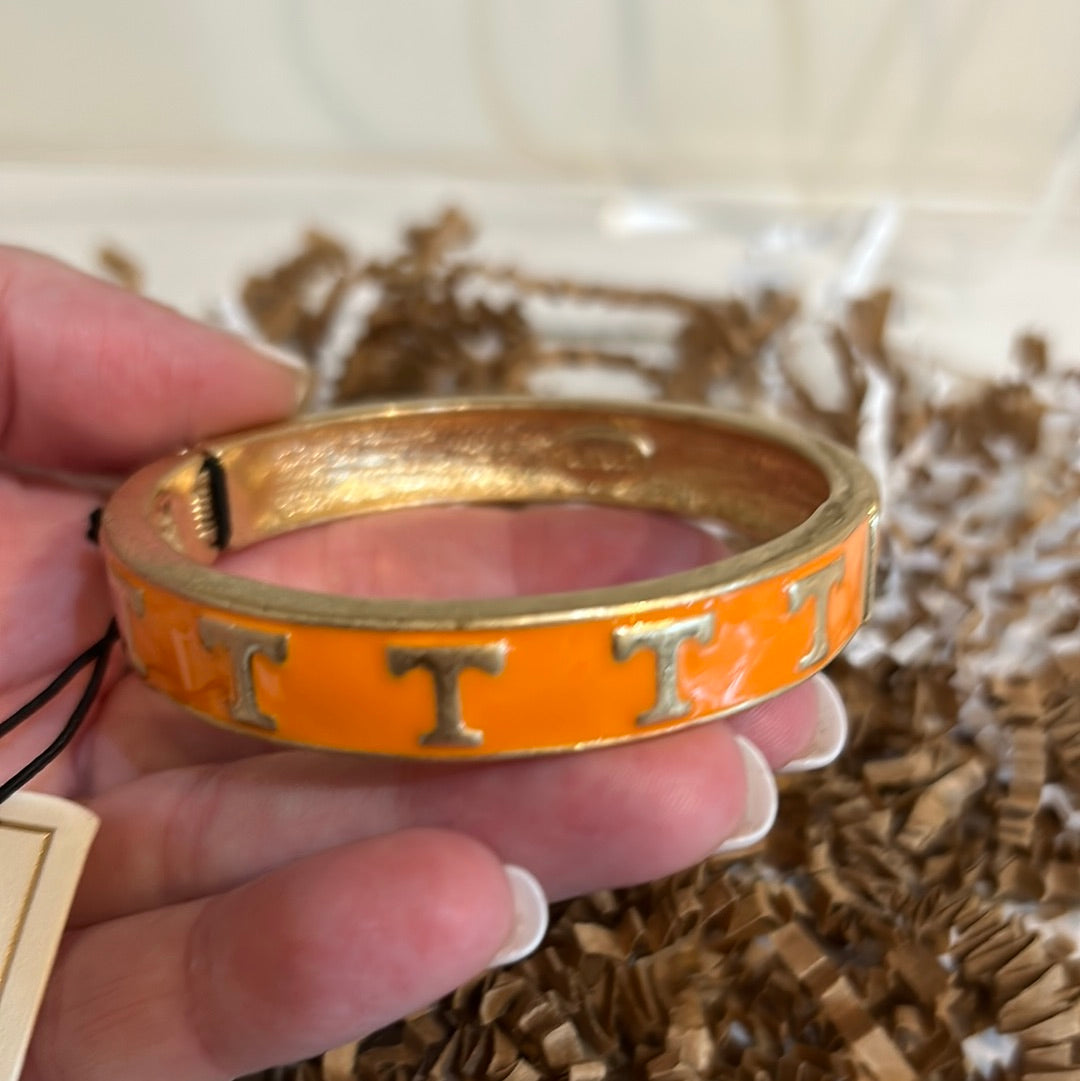 Gold and orange College Enamel Hinge Bangle with "T".