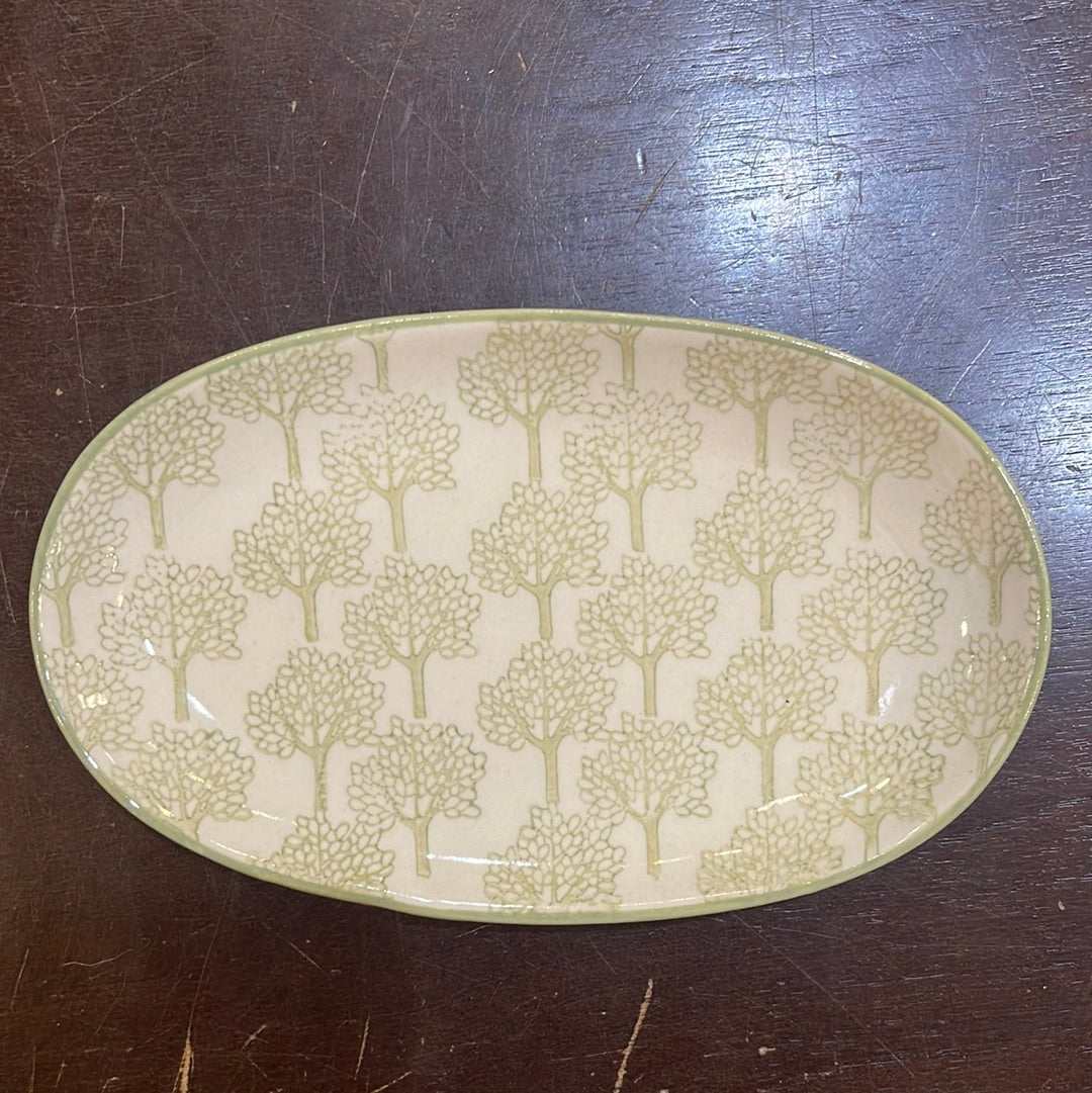 Hand stamped stoneware plate with a sage green tree design.