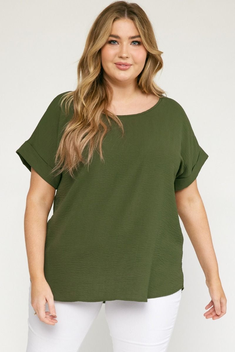 Olive scoop-neck top featuring permanent rolled sleeve detail and an asymmetrical hem.