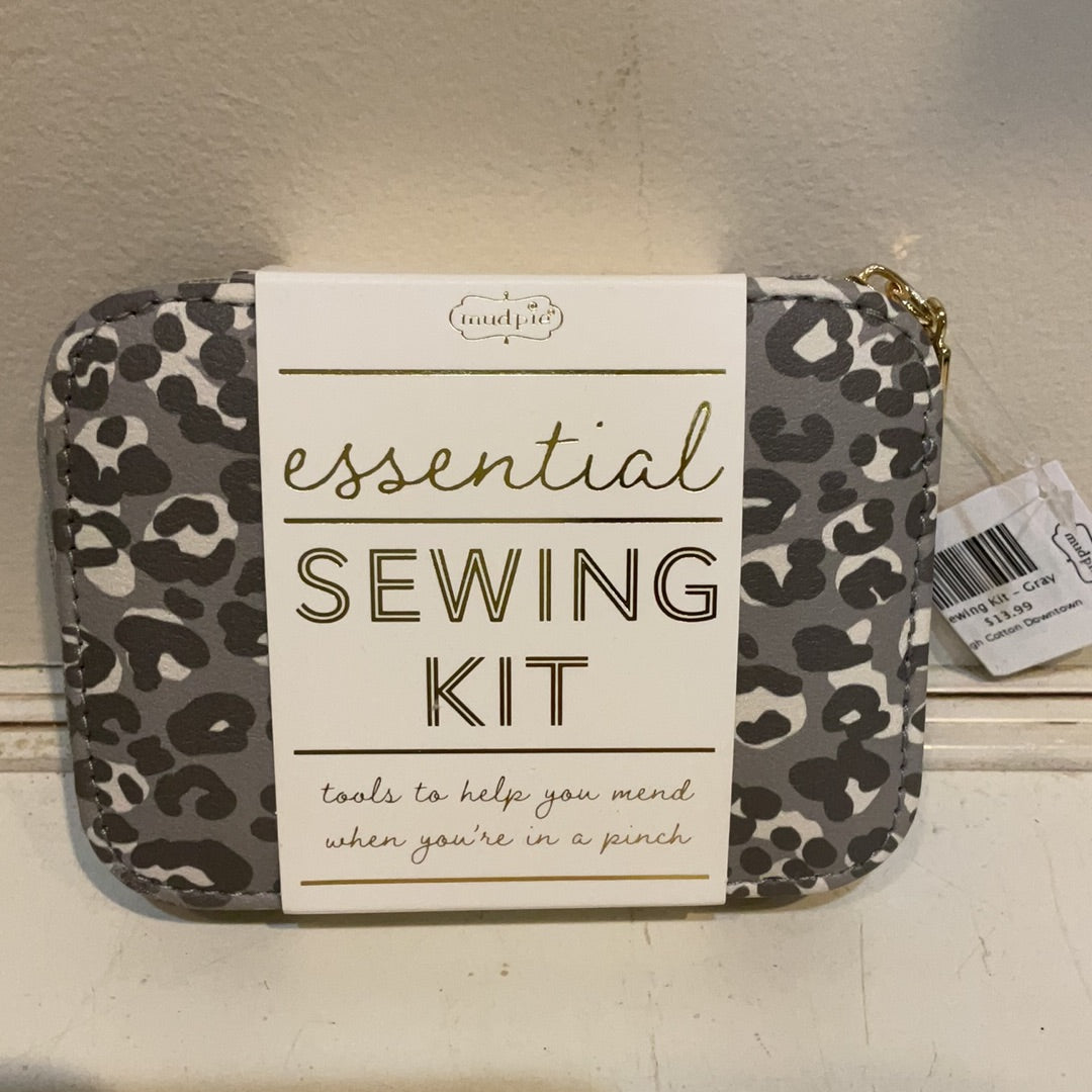 Gray sewing kit with leopard print.