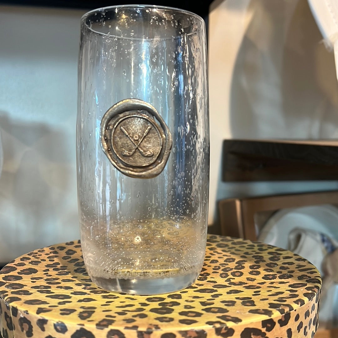 Hand blown drinking glass with custom pewter golf clubs stamp.