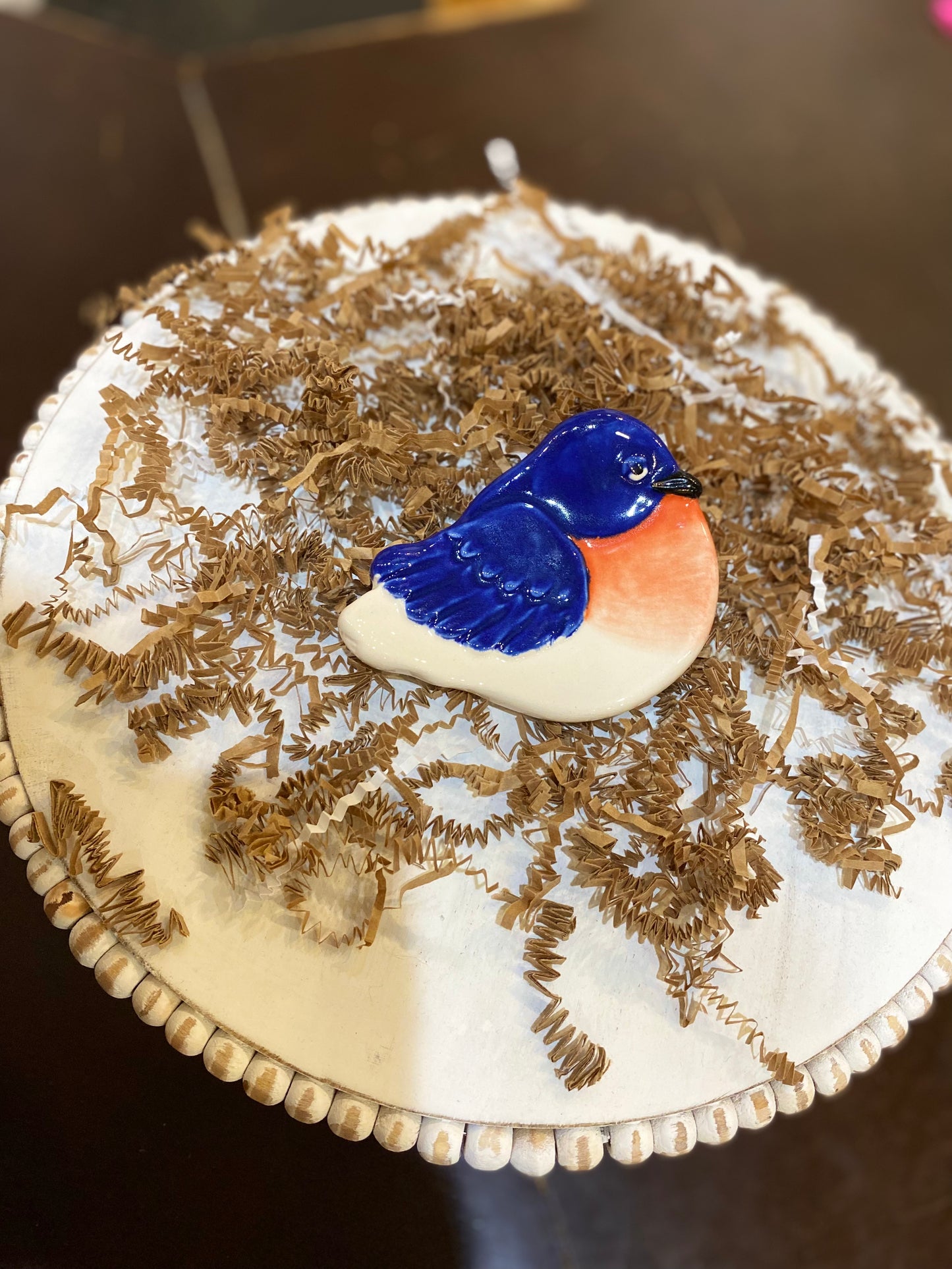 Small handmade bluebird ceramic dish.