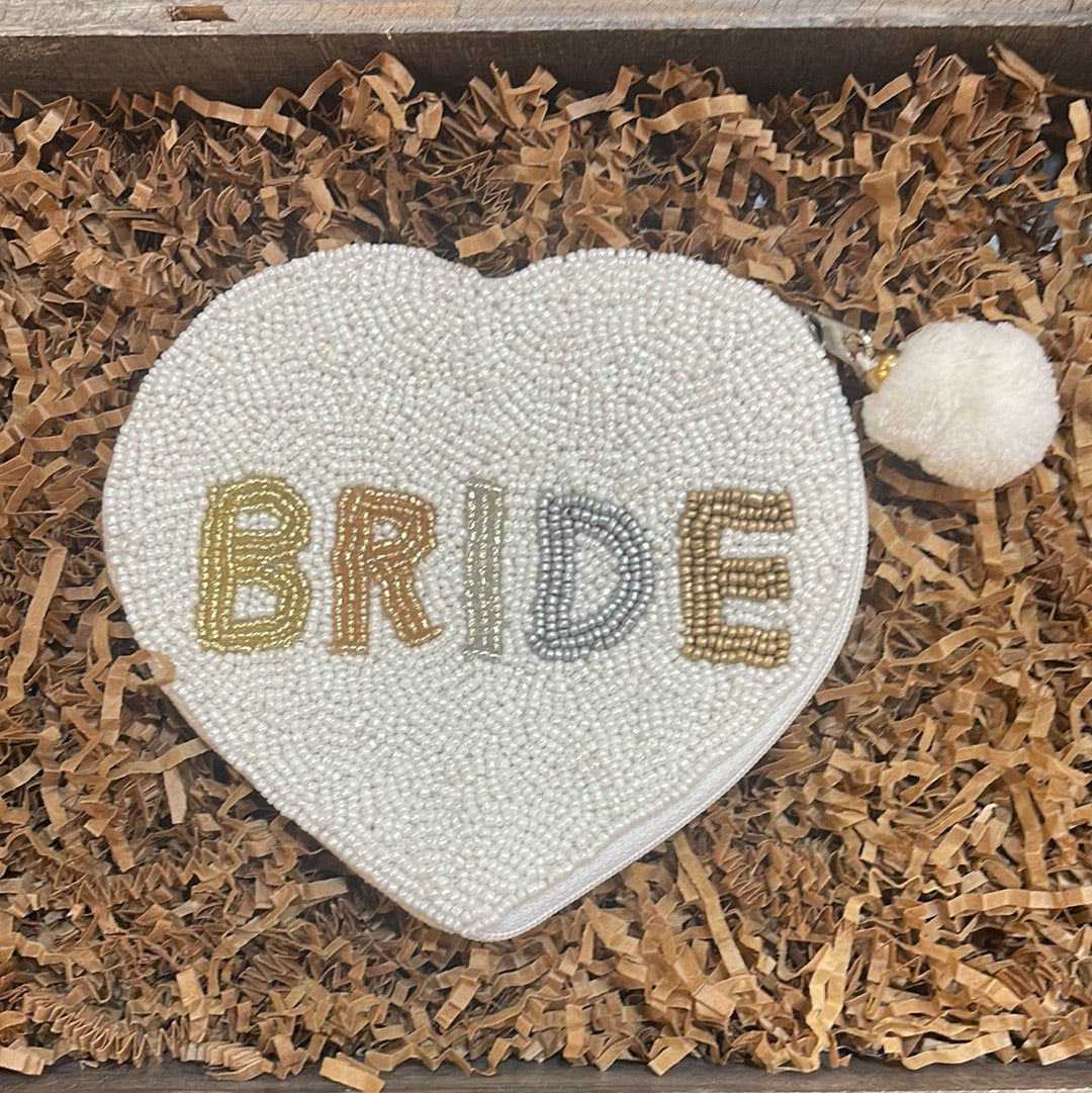 Hand sewn white beaded coin purse featuring "Bride" in the shape of a heart.