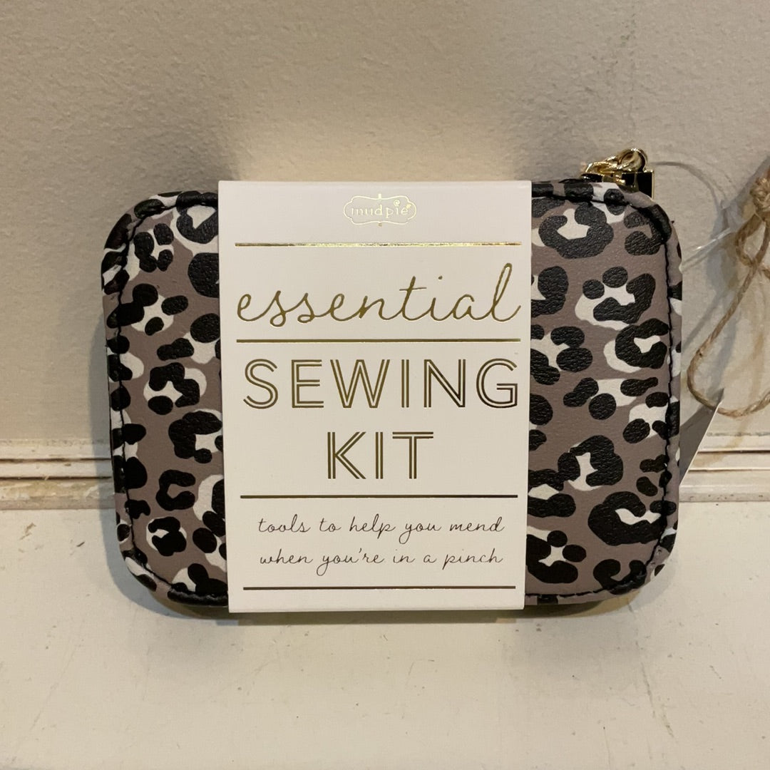 Tan sewing kit with leopard print.