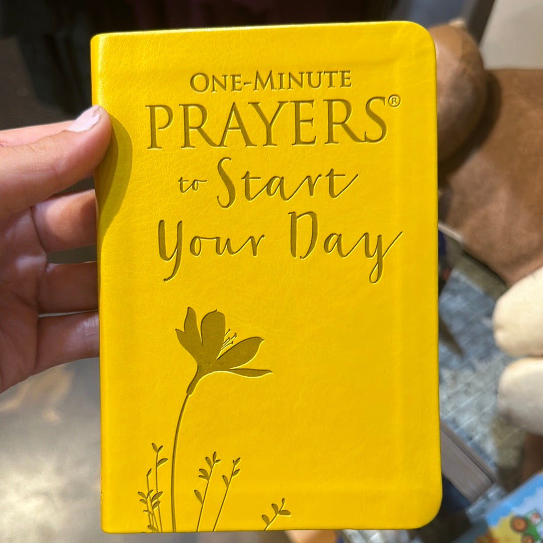 Yellow book with flower titling "One-minute Prayers to Start Your Day".