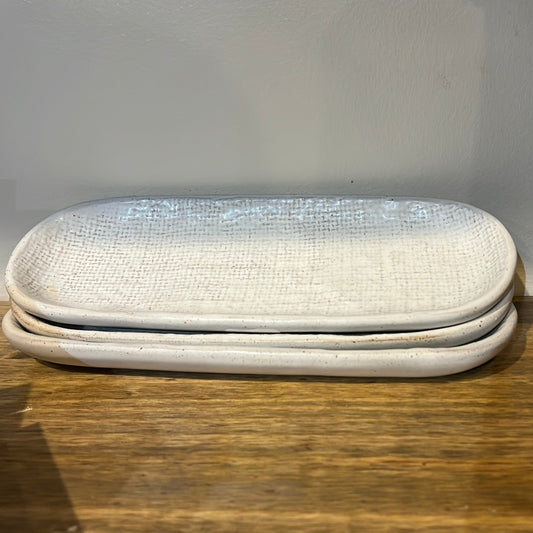 10-inch rustic, off-white ceramic tray with rounded edges.