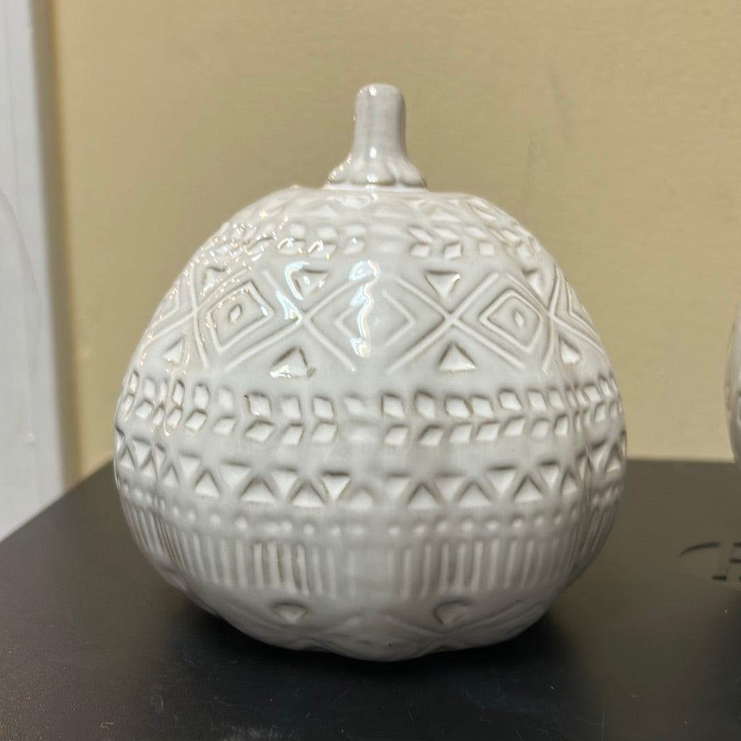 White ceramic decorative pumpkin with boho pattern.