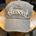 Gray women's hat featuring "Blessed".