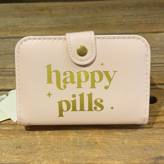 Off white pill box with button clasp featuring "happy pills" in golden lettering.