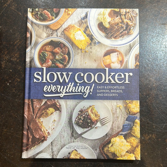 Book with assorted plates and bowls of food titling "Slow Cooker Everything!"