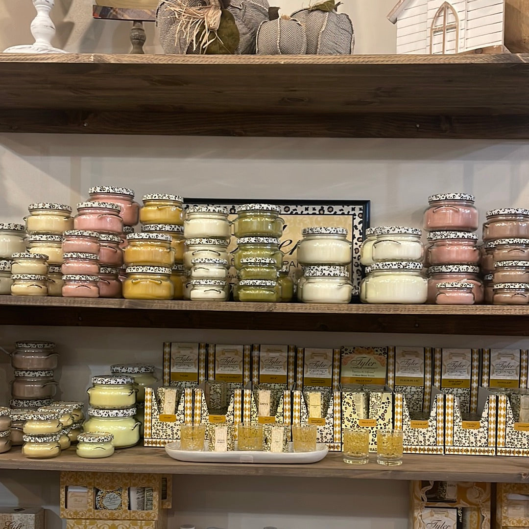 Assorted Tyler Candle Company candles.