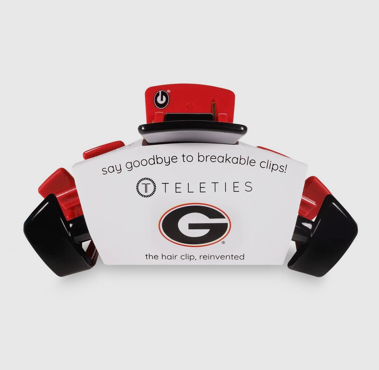 University of Georgia Collegiate Teletie Claw Clip in red and black. Side view with packaging.