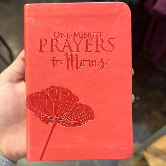 Red book with flower titling "One-minute Prayers for Moms".