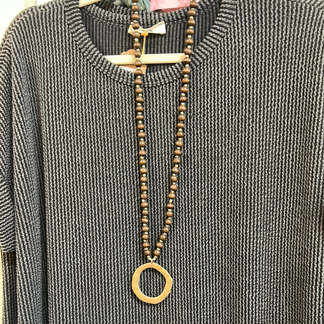 Brown Wood Beaded Necklace with Golden round Charm.