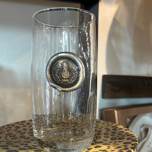 Hand blown drinking glass with custom pewter pineapple stamp.