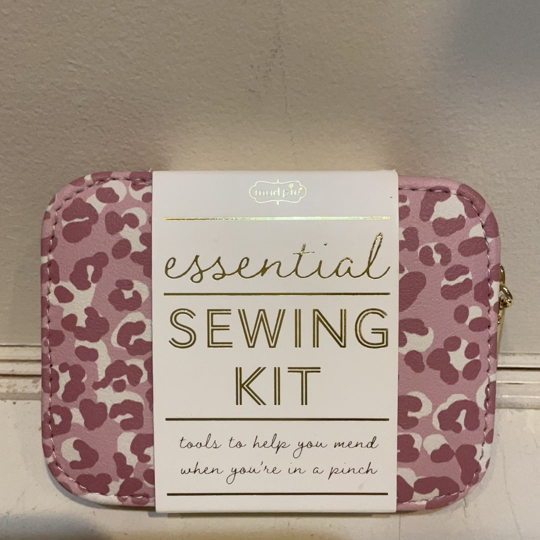 Pink sewing kit with leopard print.